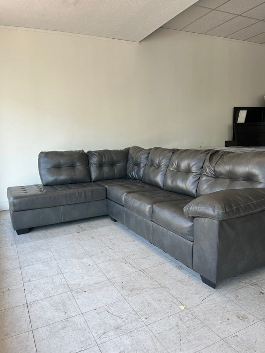 2010267 Grey Sectional Trading Post