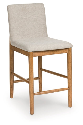 Isanti Upholstered Barstool (2/CN) Millennium® by Ashley