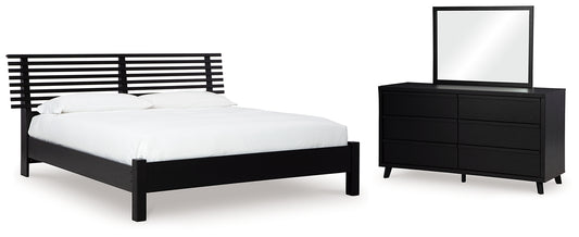Danziar King Panel Bed with Mirrored Dresser Signature Design by Ashley®