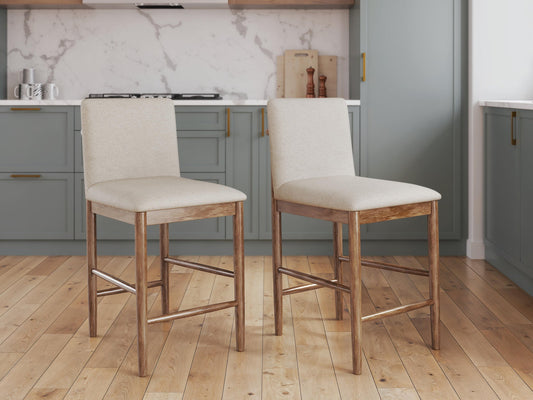 Isanti Upholstered Barstool (2/CN) Millennium® by Ashley