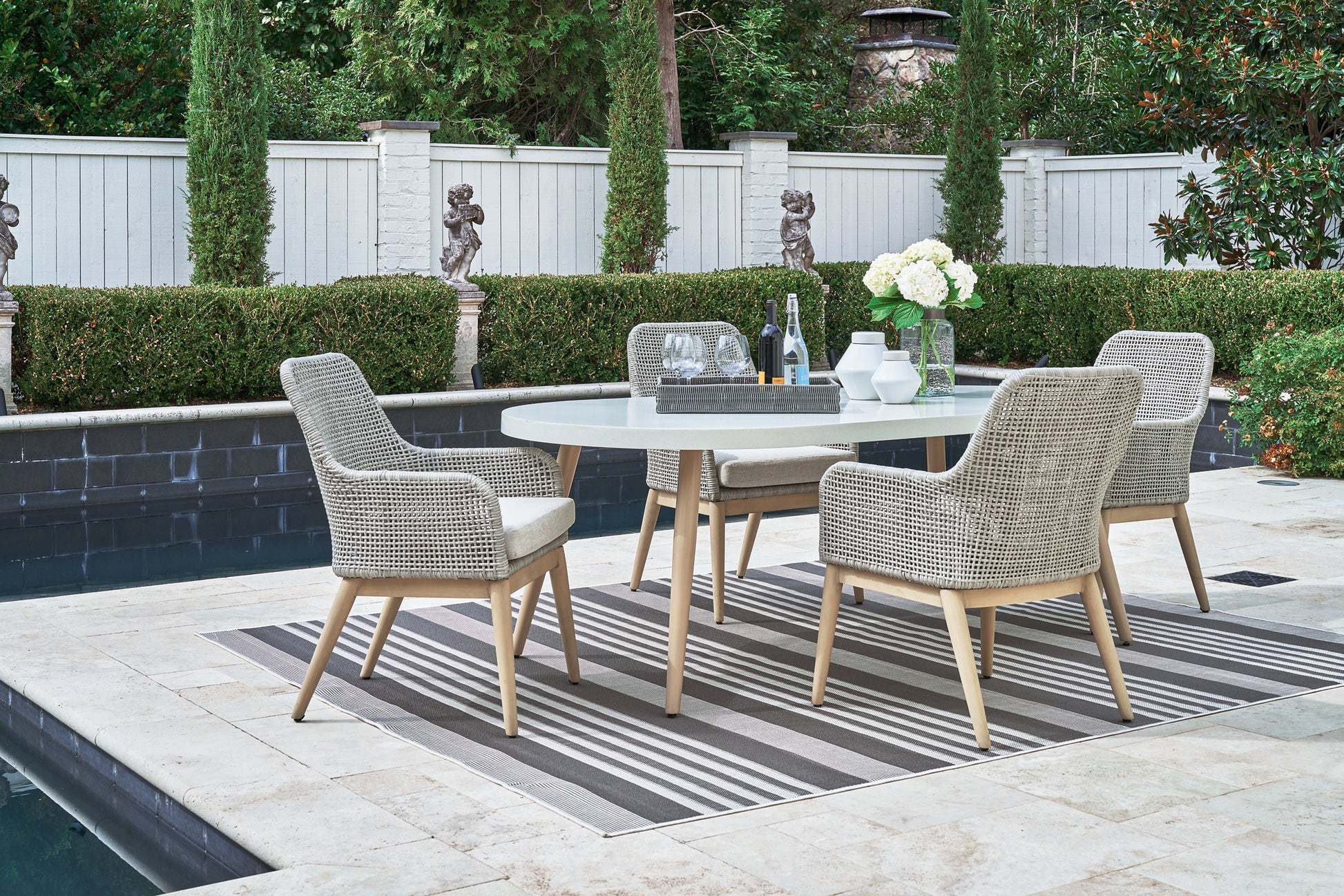 Seton Creek Outdoor Dining Table and 4 Chairs Signature Design by Ashley®
