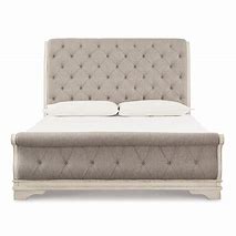 Realyn Sleigh Upholstered Bedroom Set Ashley Furniture