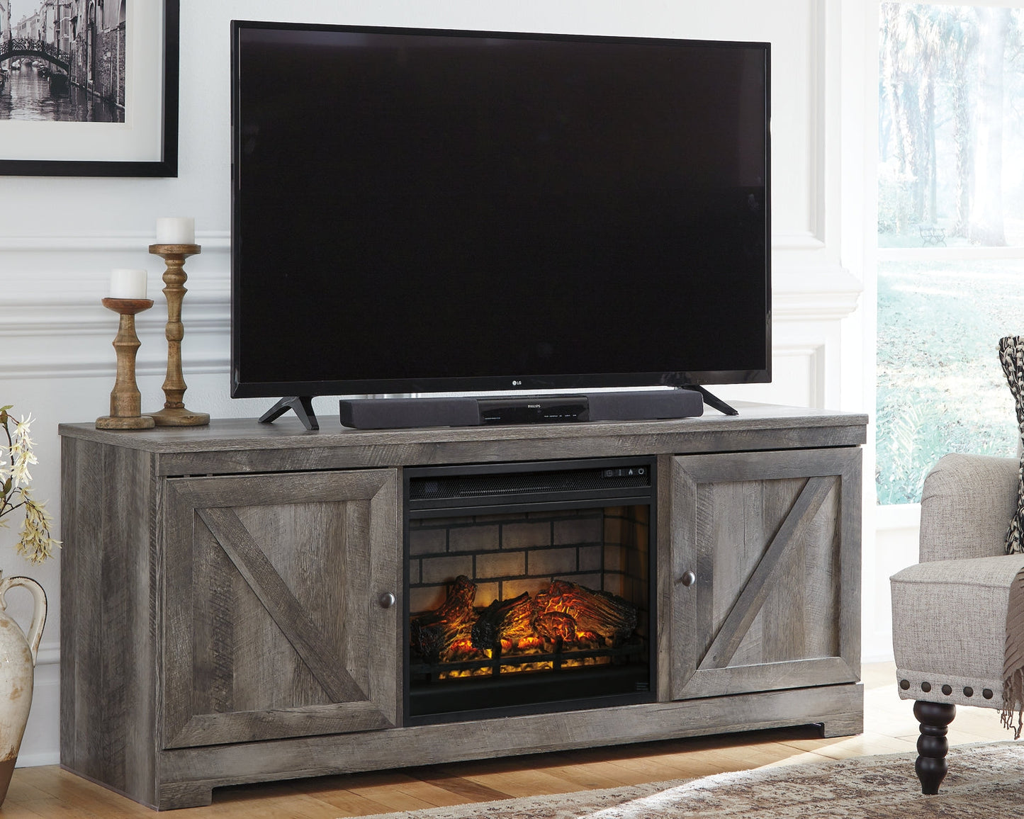 Wynnlow 63" TV Stand with Electric Fireplace Signature Design by Ashley®