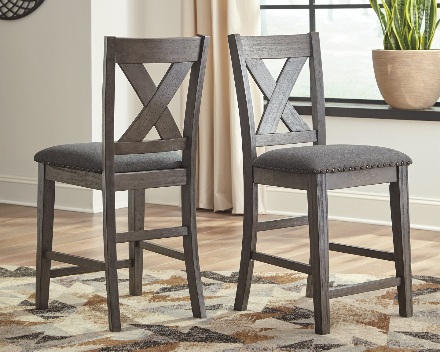 Caitbrook Counter Height Dining Table and 4 Barstools Signature Design by Ashley®