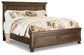 Flynnter California King Panel Bed with 2 Storage Drawers with Mirrored Dresser, Chest and Nightstand Signature Design by Ashley®