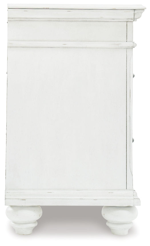 Kanwyn Three Drawer Night Stand Benchcraft®