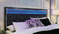 Kaydell King Upholstered Panel Storage Platform Bed with Mirrored Dresser and Chest Signature Design by Ashley®