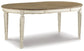 Realyn Dining Table and 8 Chairs Signature Design by Ashley®