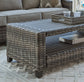 Oasis Court Sofa/Chairs/Table Set (4/CN) Signature Design by Ashley®