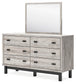 Vessalli King Panel Bed with Mirrored Dresser and Nightstand Signature Design by Ashley®