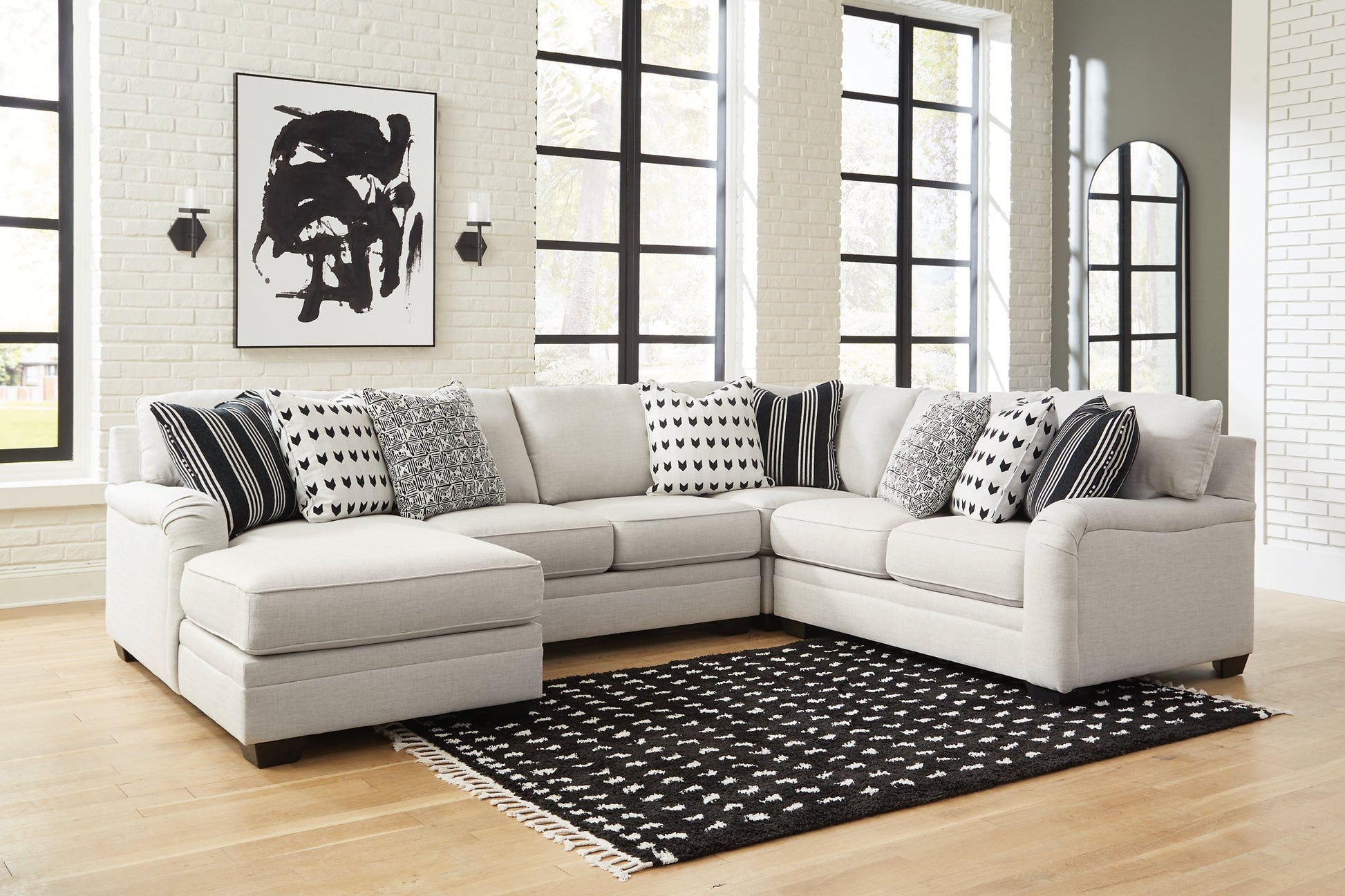 Huntsworth 4-Piece Sectional with Ottoman Signature Design by Ashley®