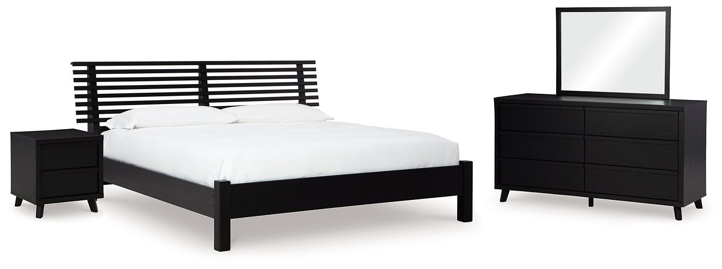 Danziar Queen Panel Bed with Mirrored Dresser and Nightstand Signature Design by Ashley®