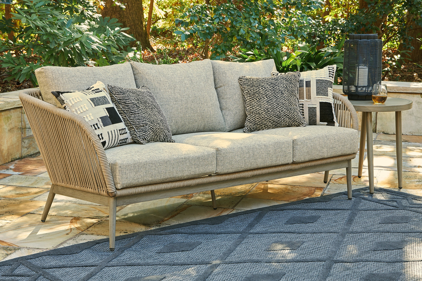 Swiss Valley Outdoor Sofa and  2 Lounge Chairs with Coffee Table and 2 End Tables Signature Design by Ashley®