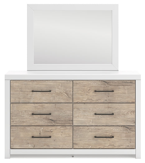Charbitt King Panel Bed with Mirrored Dresser Signature Design by Ashley®