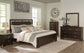 Covetown King Panel Bed with Mirrored Dresser, Chest and 2 Nightstands Signature Design by Ashley®