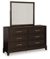 Neymorton Queen Upholstered Panel Bed with Mirrored Dresser Signature Design by Ashley®