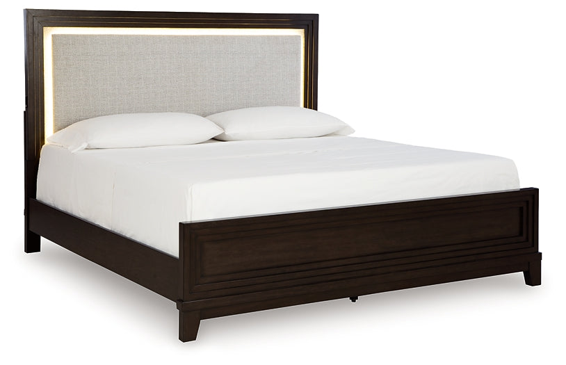 Neymorton California King Upholstered Panel Bed with Mirrored Dresser, Chest and Nightstand Signature Design by Ashley®