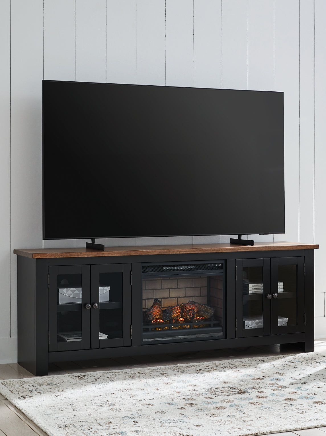 Wildenauer 76" TV Stand with Electric Fireplace Signature Design by Ashley®