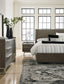 Arkenton Queen Panel Bed with Mirrored Dresser and 2 Nightstands Ashley®