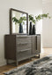 Arkenton Queen Panel Bed with Mirrored Dresser and 2 Nightstands Ashley®