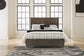 Arkenton Queen Panel Bed with Mirrored Dresser Ashley®