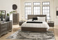 Arkenton California King Panel Bed with Mirrored Dresser, Chest and 2 Nightstands Ashley®