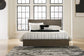 Arkenton California King Panel Bed with Mirrored Dresser, Chest and 2 Nightstands Ashley®