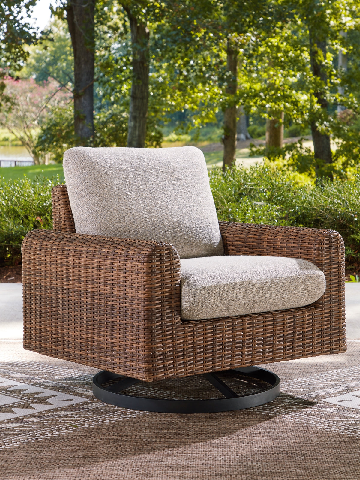 Dolan Creek Swivel Lounge w/ Cushion Signature Design by Ashley®