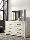 Cambeck Queen Panel Bed with 4 Storage Drawers with Mirrored Dresser Signature Design by Ashley®
