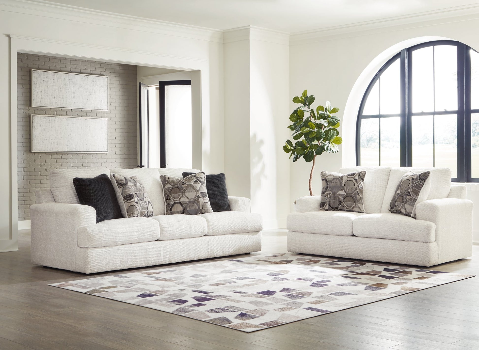 Karinne Sofa, Loveseat, Chair and Ottoman Signature Design by Ashley®