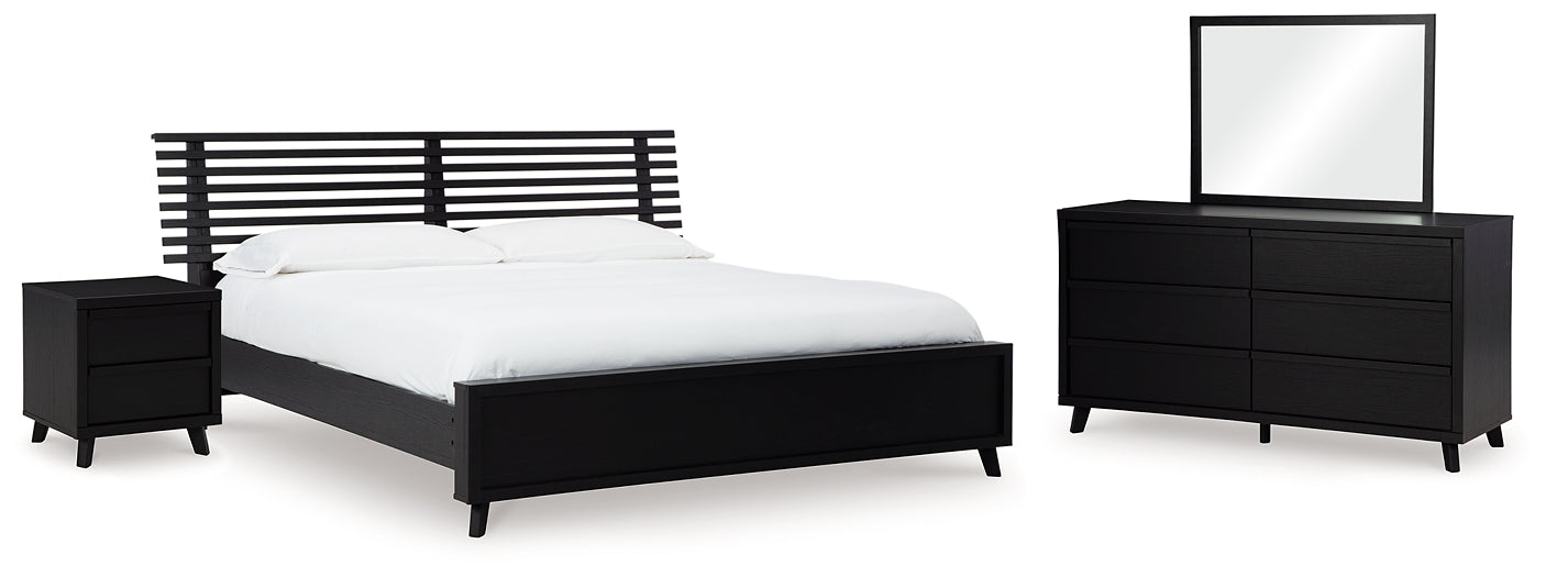 Danziar King Panel Bed with Mirrored Dresser and Nightstand Signature Design by Ashley®