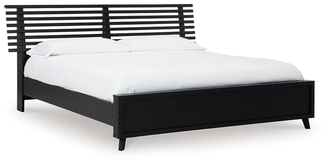 Danziar King Panel Bed with Mirrored Dresser and Nightstand Signature Design by Ashley®