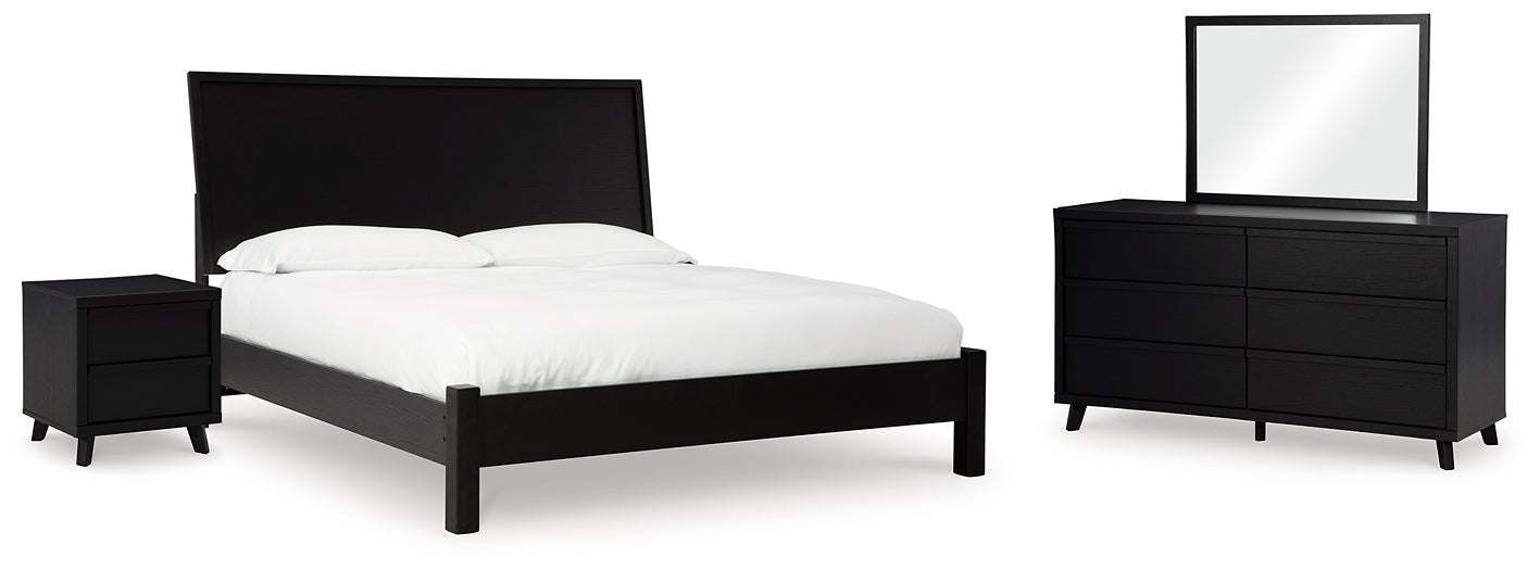 Danziar Queen Panel Bed with Mirrored Dresser and Nightstand Signature Design by Ashley®