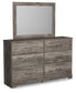 Ralinksi King Panel Bed with Mirrored Dresser, Chest and Nightstand Signature Design by Ashley®