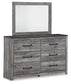 Bronyan King Panel Bed with Mirrored Dresser and Nightstand Signature Design by Ashley®