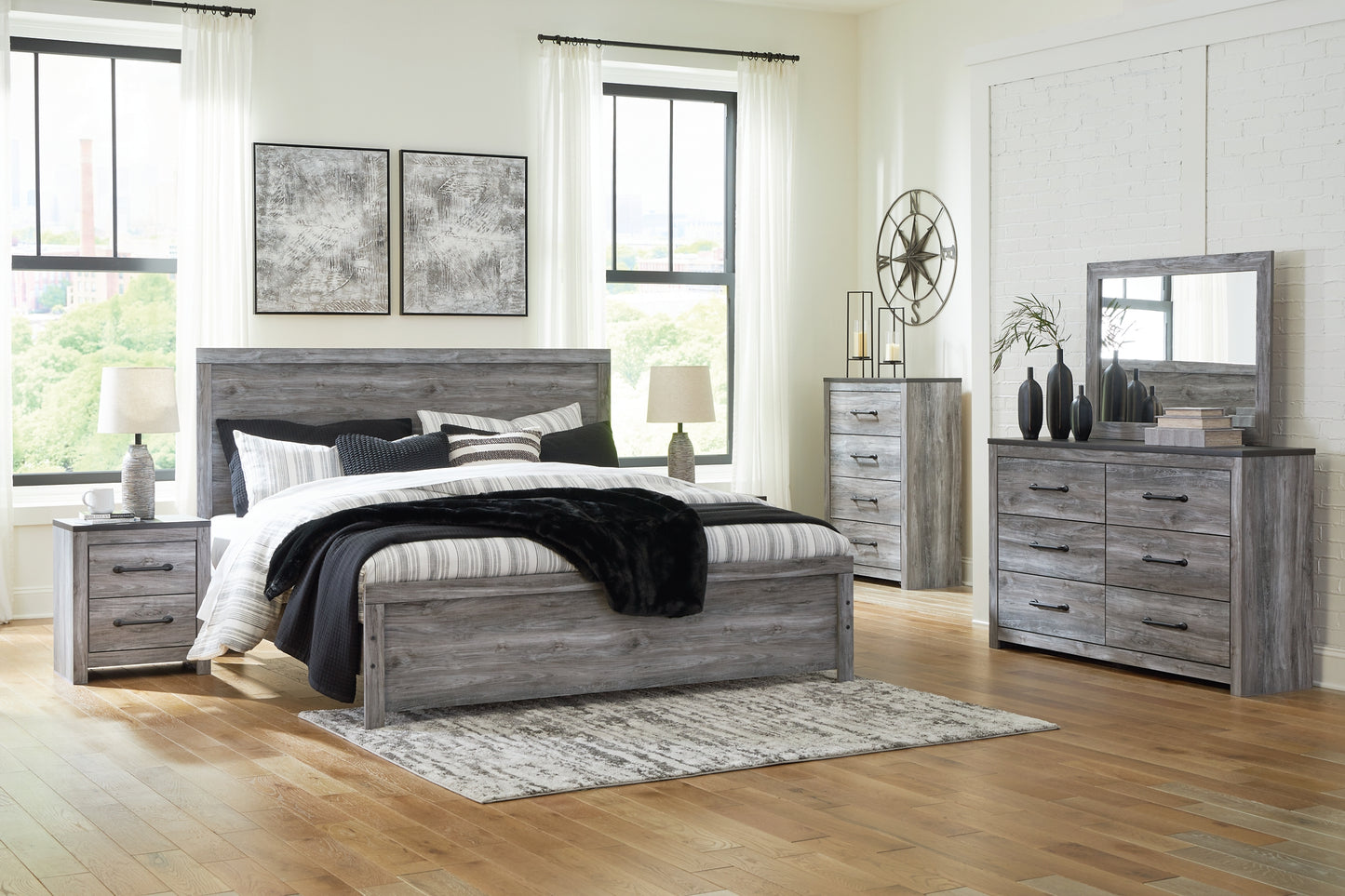 Bronyan King Panel Bed with Mirrored Dresser and Nightstand Signature Design by Ashley®