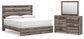 Graystorm King Panel Bed with Mirrored Dresser Signature Design by Ashley®