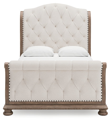 Ardenfield Queen Upholstered Sleigh Bed with Mirrored Dresser, Chest and Nightstand Signature Design by Ashley®
