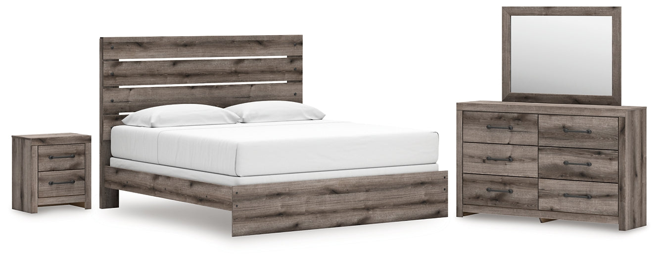 Graystorm King Panel Bed with Mirrored Dresser and Nightstand Signature Design by Ashley®