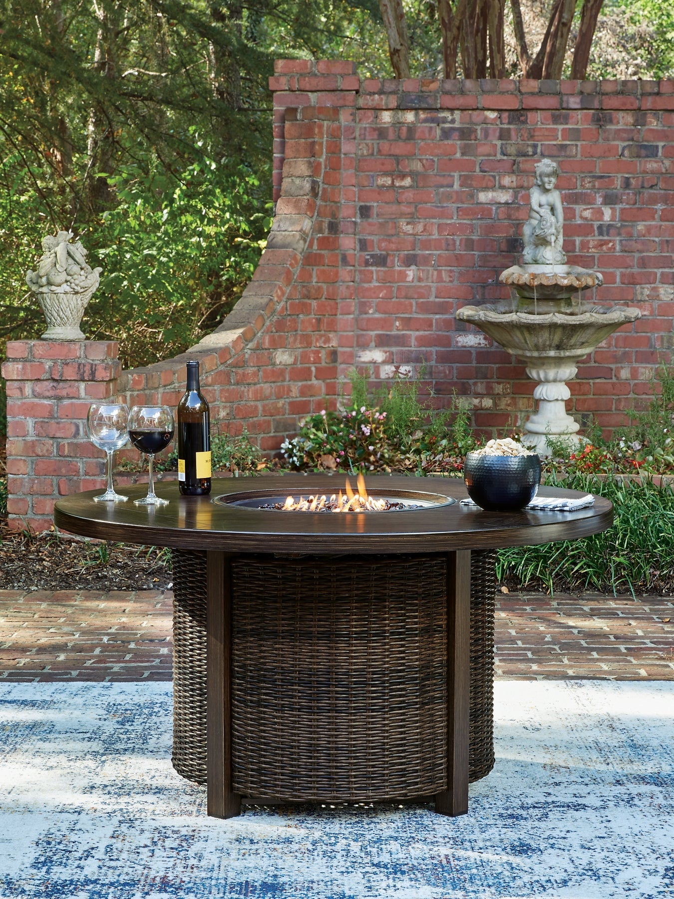 Monterey Point Round Fire Pit Table Signature Design by Ashley®