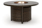 Monterey Point Round Fire Pit Table Signature Design by Ashley®
