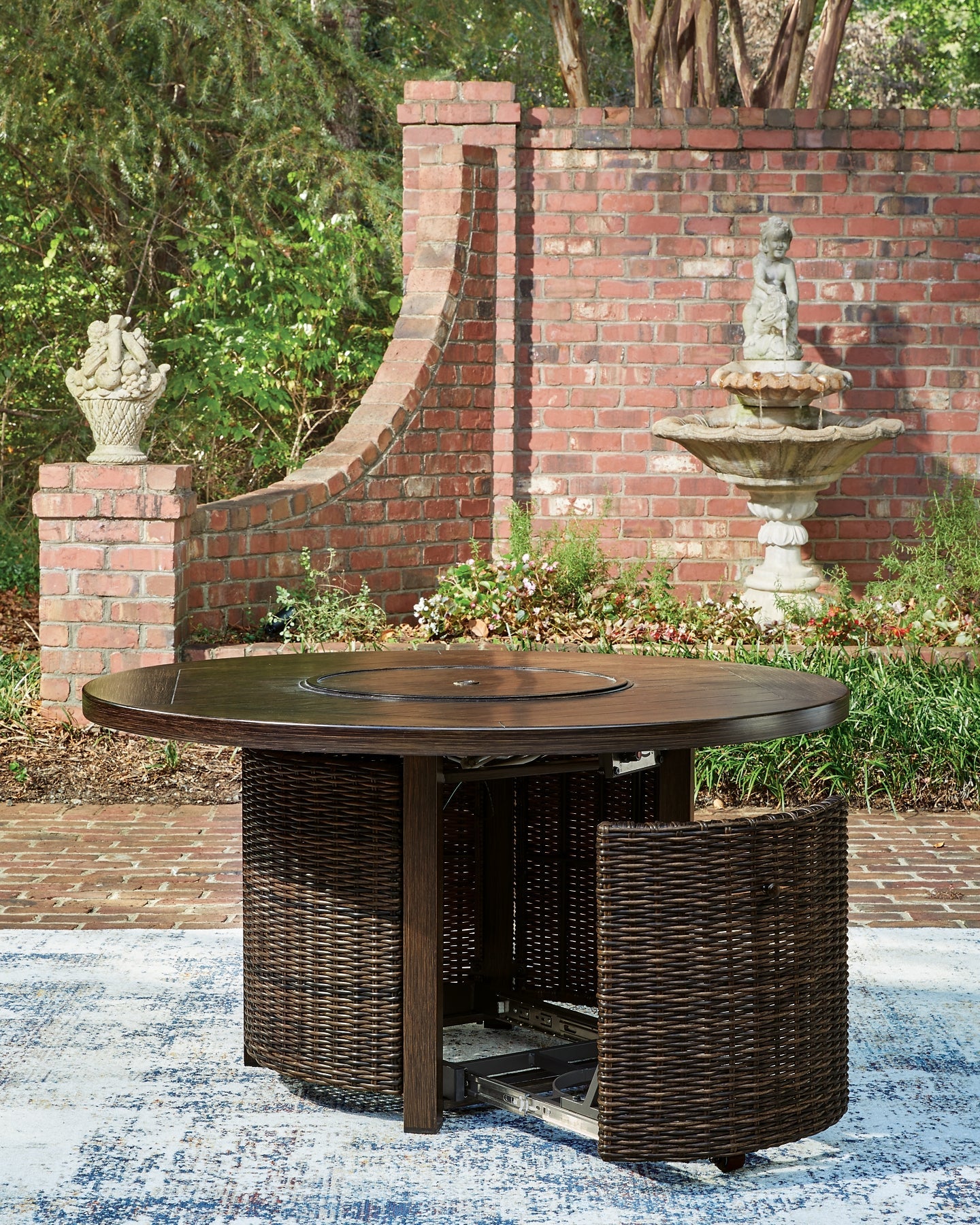 Monterey Point Round Fire Pit Table Signature Design by Ashley®