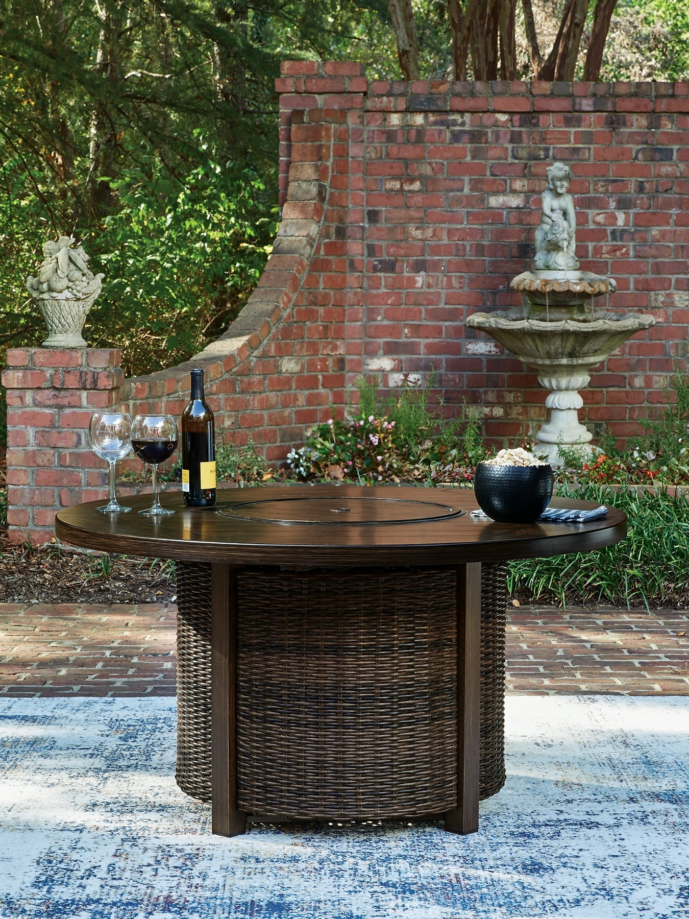 Monterey Point Round Fire Pit Table Signature Design by Ashley®