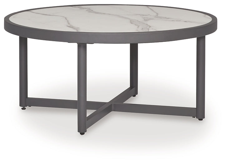 Ocean Beach Round Cocktail Table Signature Design by Ashley®