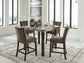 Jeshina Counter Height Dining Table and 4 Barstools Signature Design by Ashley®