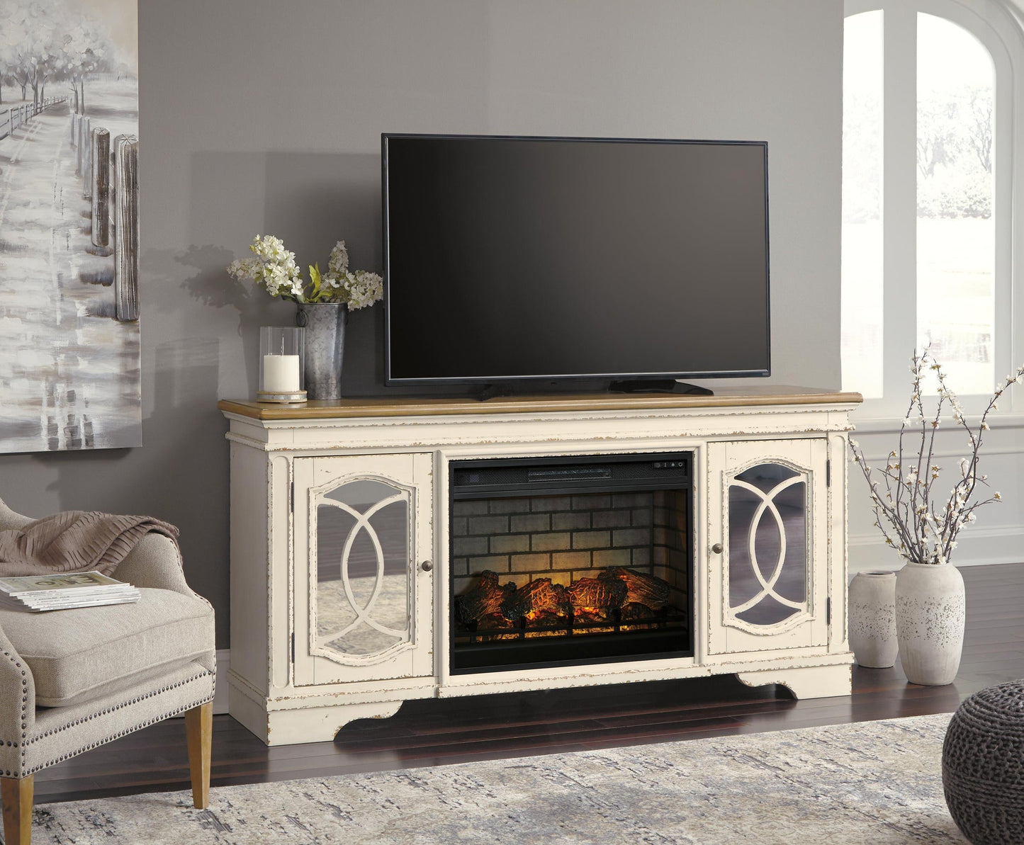 Realyn 74" TV Stand with Electric Fireplace Signature Design by Ashley®