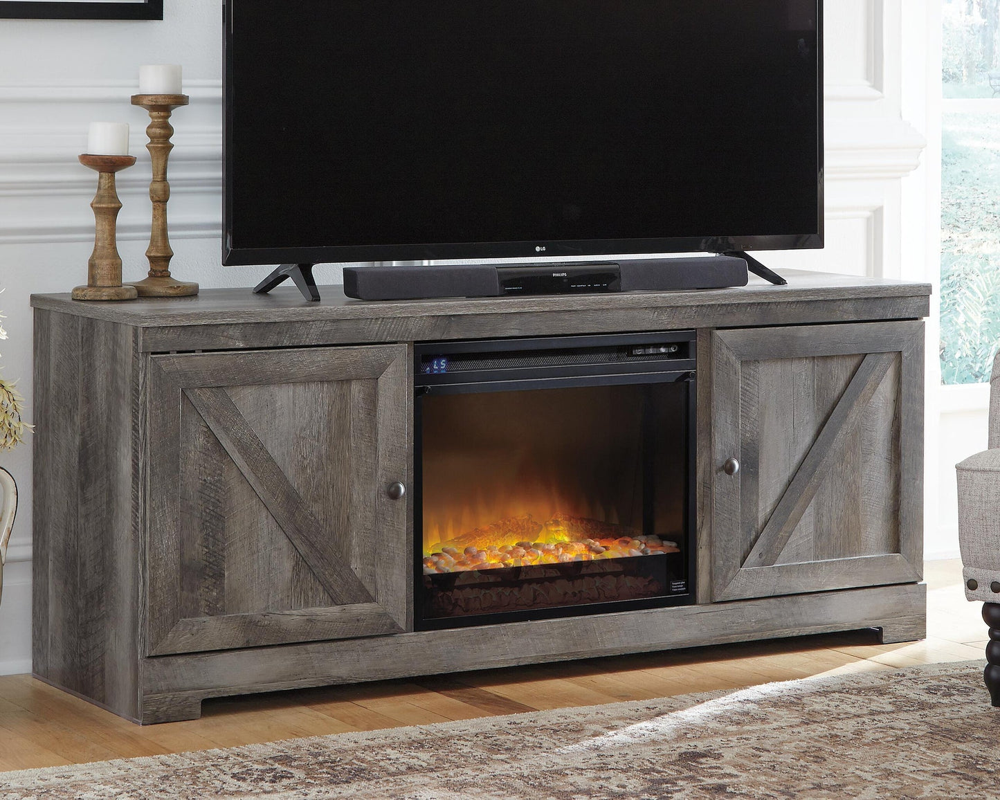 Wynnlow 63" TV Stand with Electric Fireplace Signature Design by Ashley®
