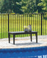 Hyland Wave Rectangular Cocktail Table Signature Design by Ashley®