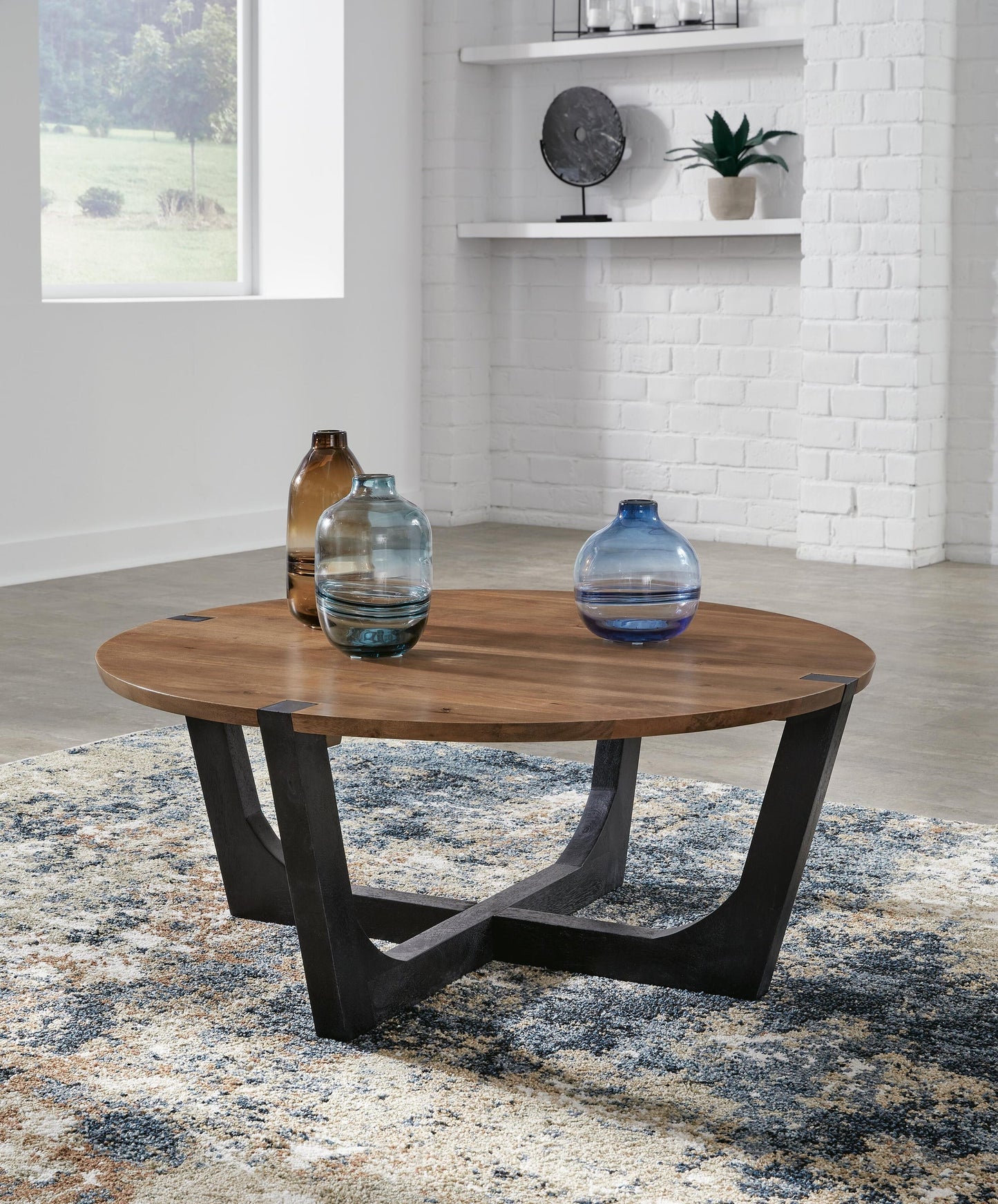 Hanneforth Round Cocktail Table Signature Design by Ashley®