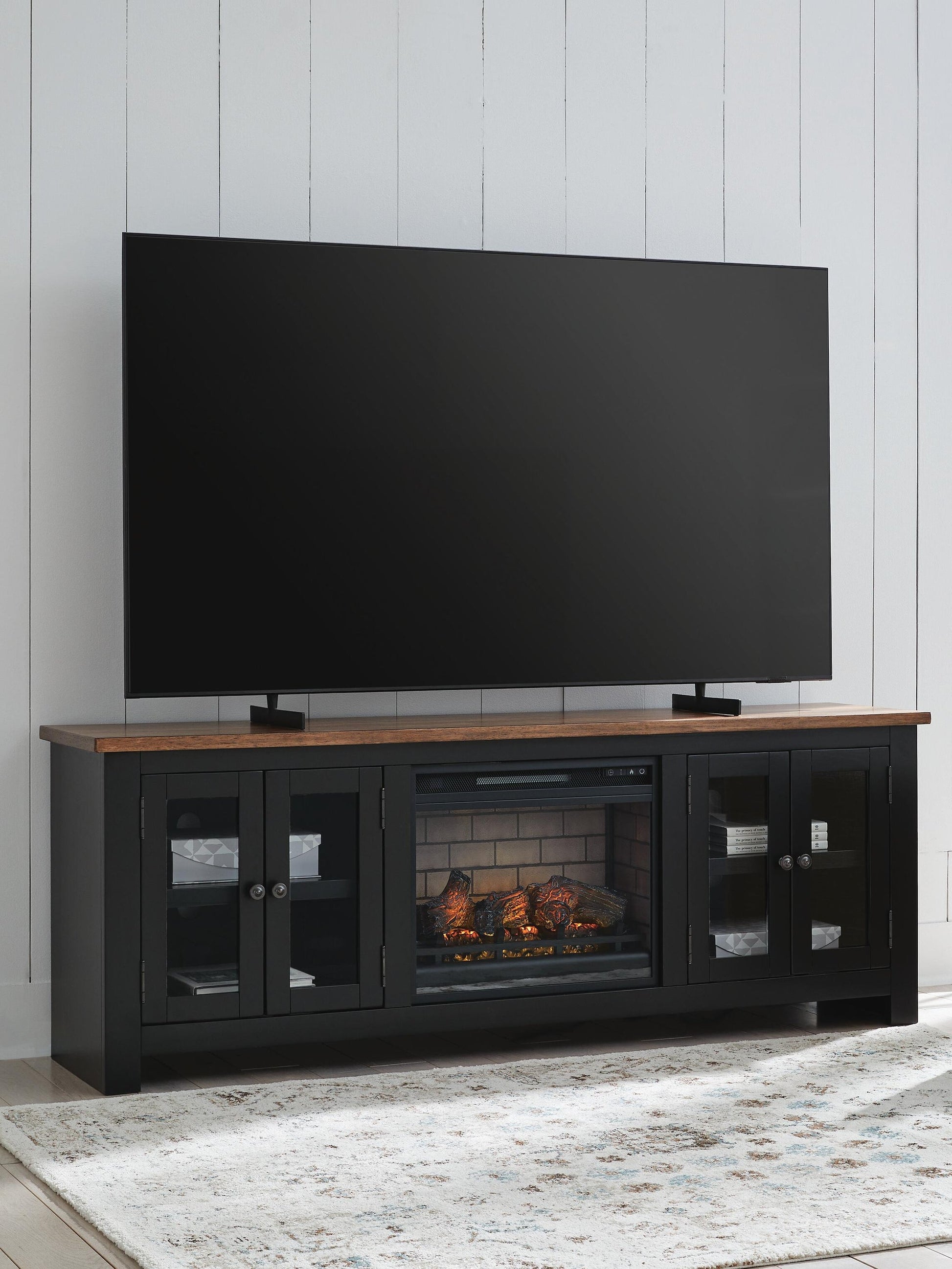 Wildenauer 76" TV Stand with Electric Fireplace Signature Design by Ashley®